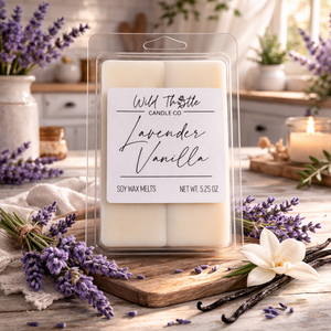 Packaged lavender vanilla soy wax melts with lavender and vanilla beans on a wooden board.